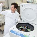 Professor Keith Chappell in the lab using a centrifuge